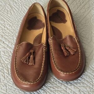 BORN brown slip ons